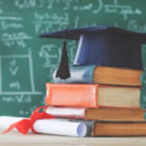 Graduation cap and text books