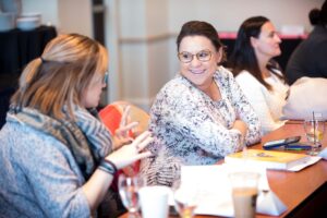 Women conversing during a workshop